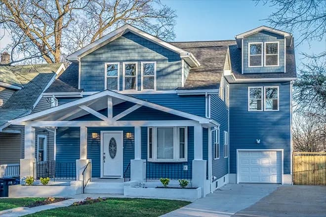 Beautiful house with light blue fiber cement siding - Integrity Home Pro
