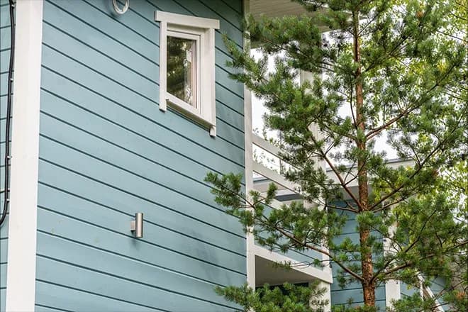 Light blue shiplap siding home